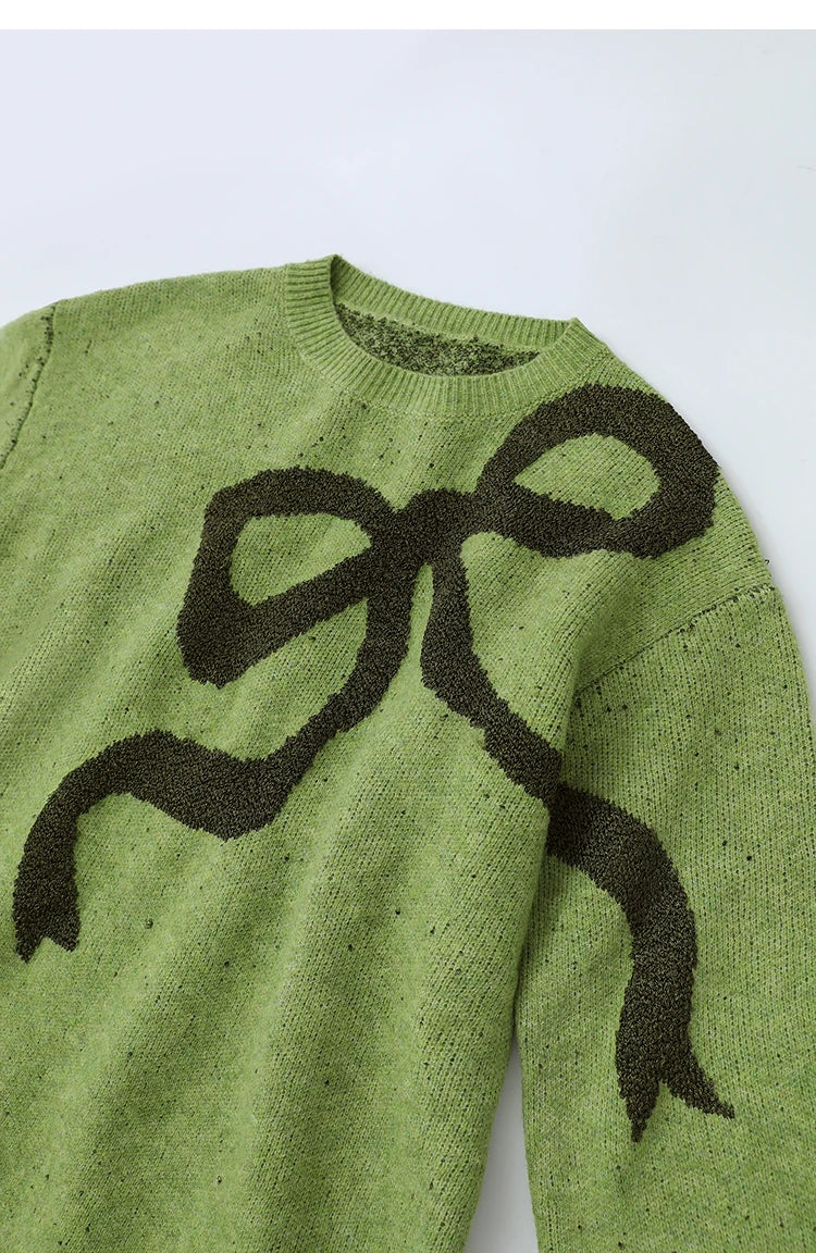 Grüner Damenpullover mit großem schwarzem Jacquard-Motiv vorn, Rundhals