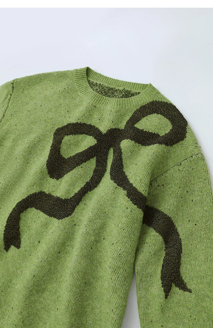 Grüner Damenpullover mit großem schwarzem Jacquard-Motiv vorn, Rundhals