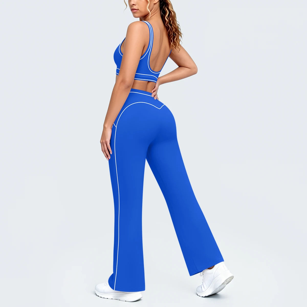 Damen Yoga-Set in Blau: Sport-BH mit Brustpolstern und weite Hose, 3/4 Rückansicht