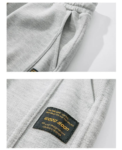 Leichte Herren-Strickjacke mit Waffelstruktur, Taschen und Reverskragen – ideal für Frühling und Herbst.