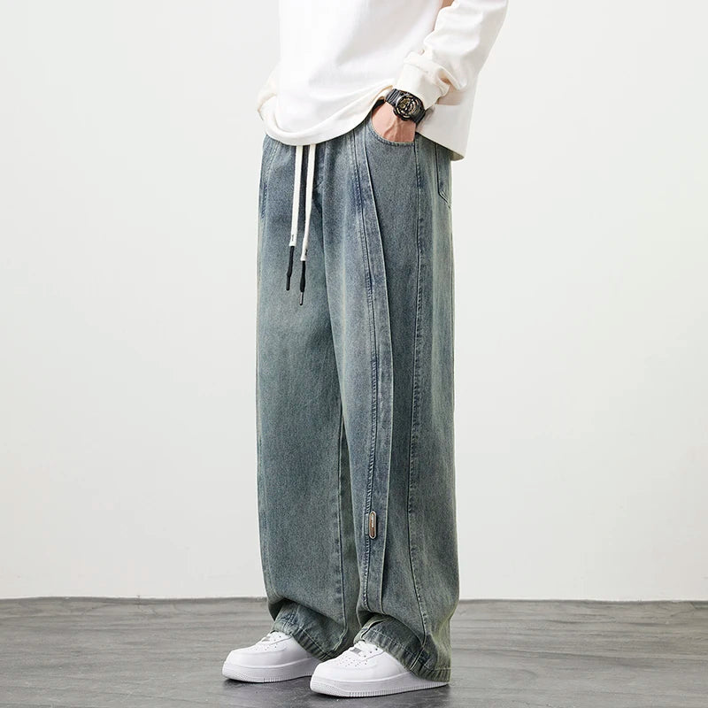 Herren Jeanshose mit brauner Stickerei im Hip Hop Stil