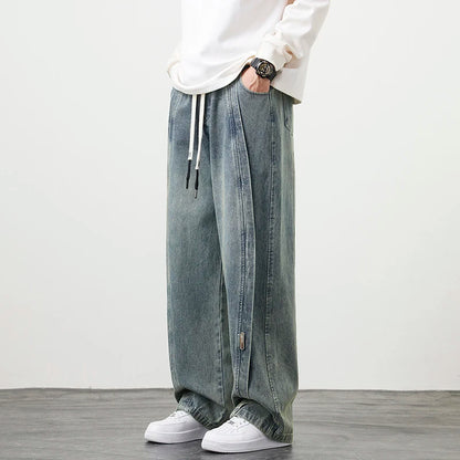 Herren Jeanshose mit brauner Stickerei im Hip Hop Stil