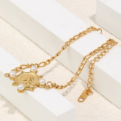Damen-Armband mit Figaro-Kette und Porträtmünze