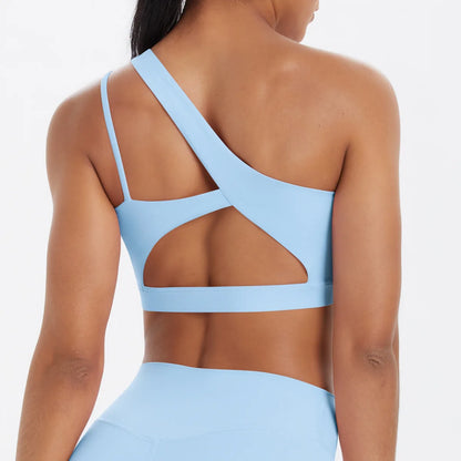 Yoga-Set Damen: hellblaues Sport-Top mit gekreuztem Rückenausschnitt