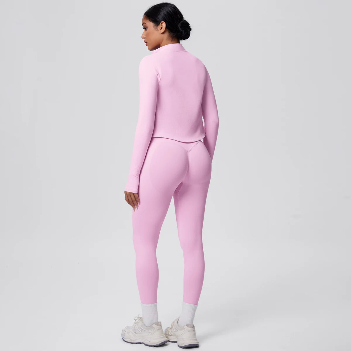 Rosa Yoga-Set mit hochgeschlossenem Rückenteil und hochtaillierter Leggings, Rücken