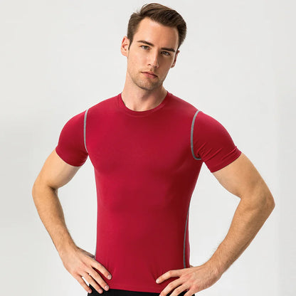 Eng anliegendes Herren-Fitness-Trainingsset mit kurzen Ärmeln – elastisch und schnelltrocknend, ideal für Sport und Laufen.