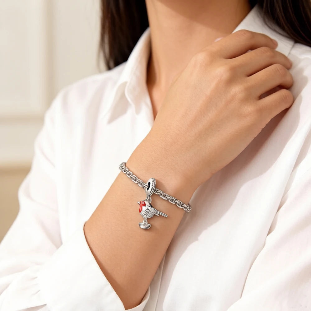 Damenarmband aus 925er Sterlingsilber mit Vogelcharme und rotem Kopfeinsatz