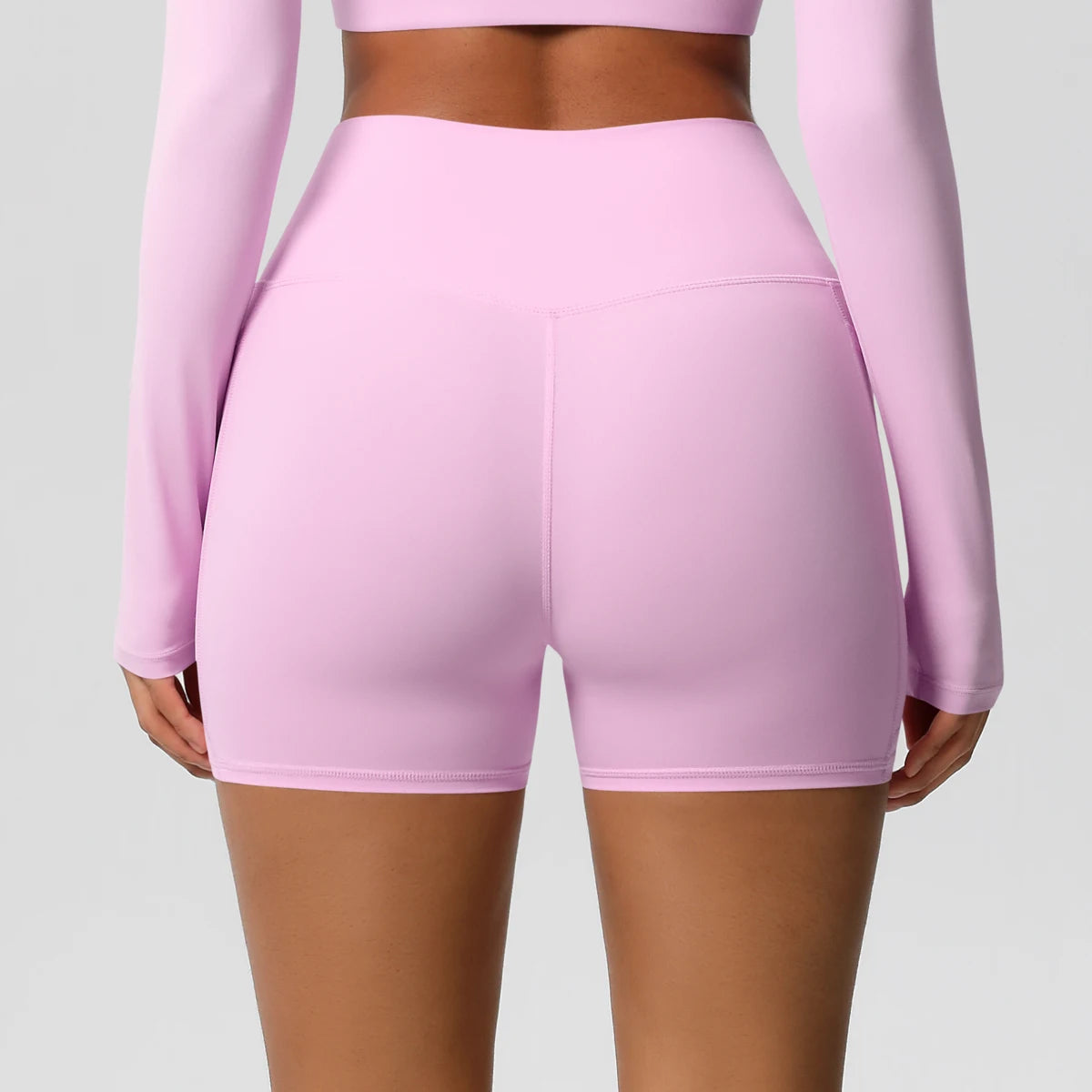 Yogahose Damen mit hoher Taille, rosafarben, hinten mit Nahtdetails