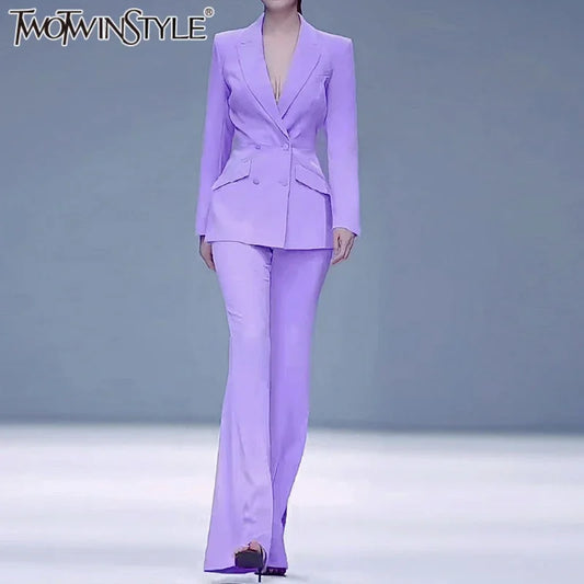 Elegantes Damenkleid mit Rundhalsausschnitt, langen Ärmeln und Spitzenbesatz – lockerer Schnitt mit Patchwork-Details und Falten-Design.