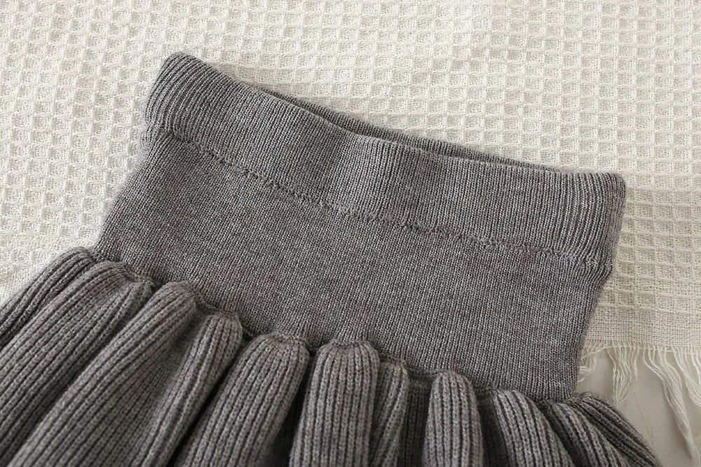 Mädchen Kleidungsset mit Bogen Druck Pullover und Faltenrock im 2-Teile Design