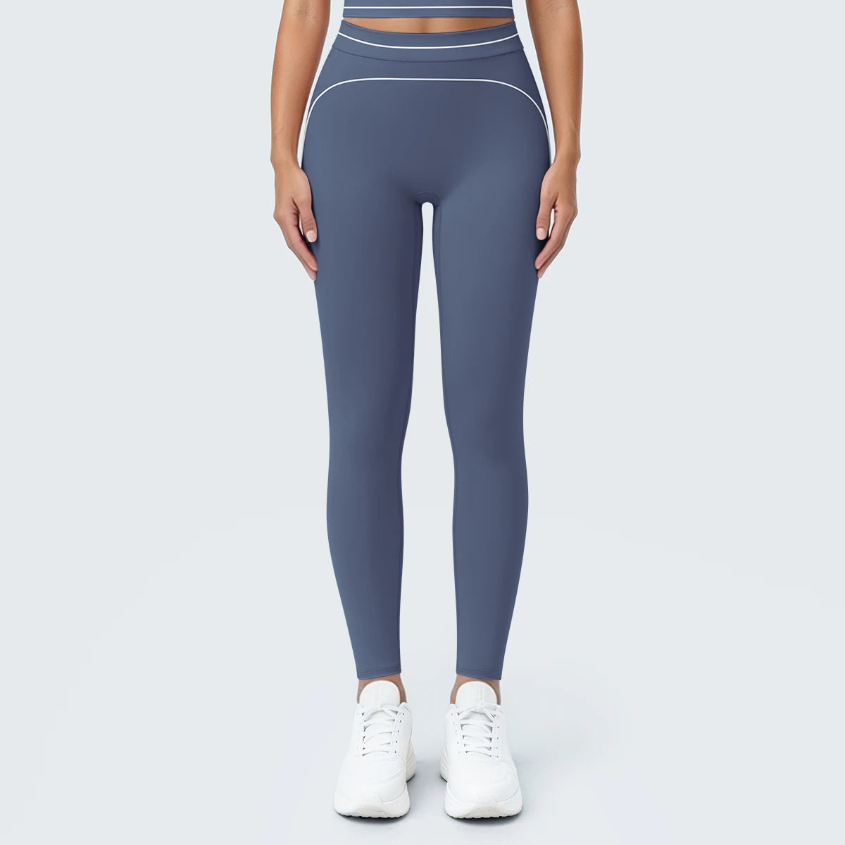 Nahtlose Yoga-Leggings mit hoher Taille, blau-grau, glatte Passform mit Kontrastlinie.