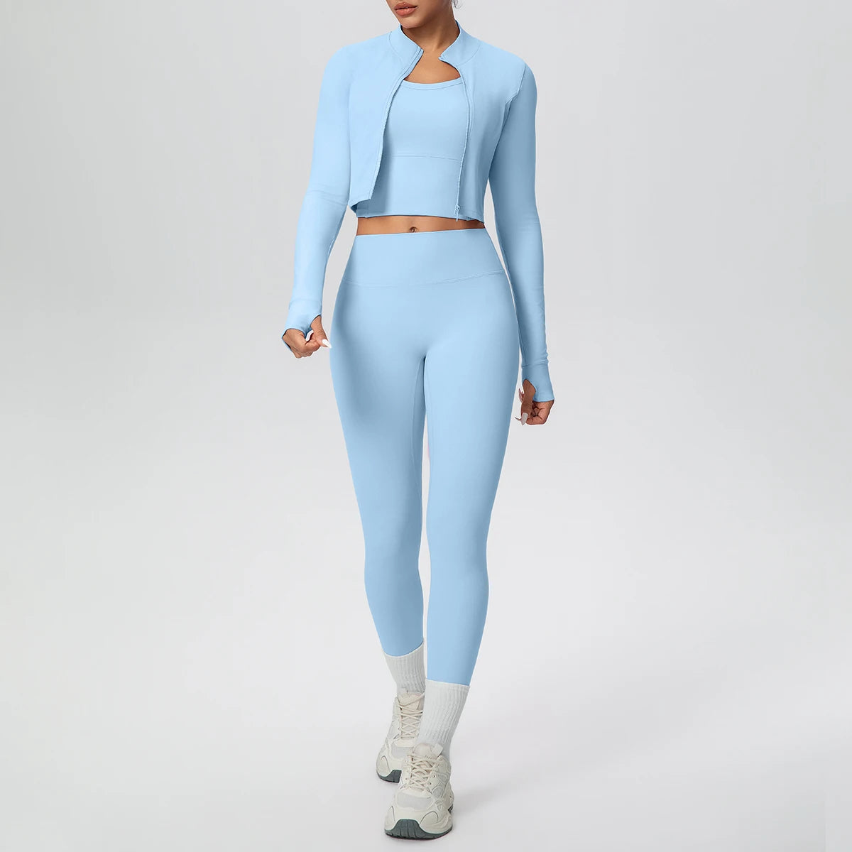 Hellblaues Yoga-Set: Zip-Top und High-Waist-Leggings, vorne
