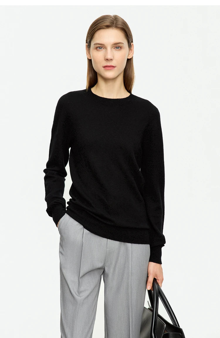 Schwarzer Pullover mit langen Ärmeln und rundem Ausschnitt, schlichtes Design
