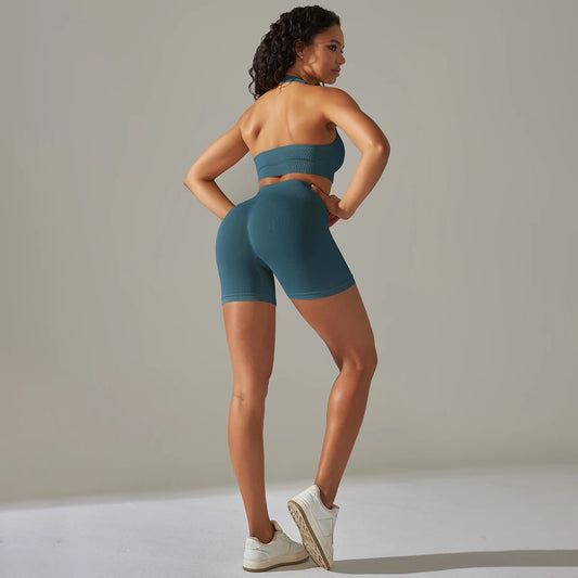 Nahtloses Damen-Yoga-Set: ärmelloses Top und Biker-Shorts in Petrolblau