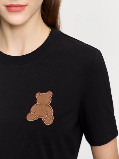 Damen Top im minimalistischen Stil mit Bären-Applikation und O-Ausschnitt