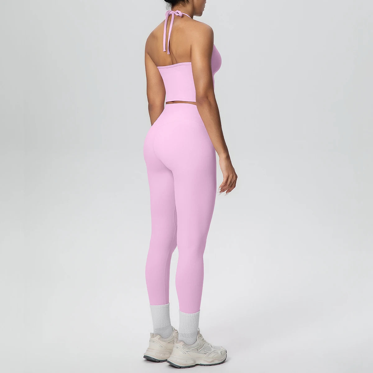 Rosa Damen-Yogaset: Tanktop mit Rückenschnürung und Capri-Leggings