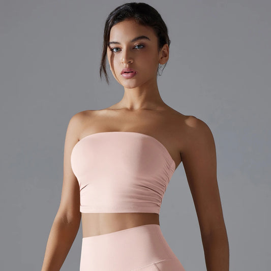 Nahtloser Sport-BH in zartrosa, trägerloser Bandeau mit breitem Unterbrustbund