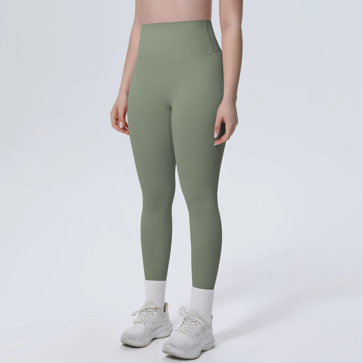 High-Waist-Yogaleggings olivgrün, Vorderansicht, figurbetontes, bequemes Bein
