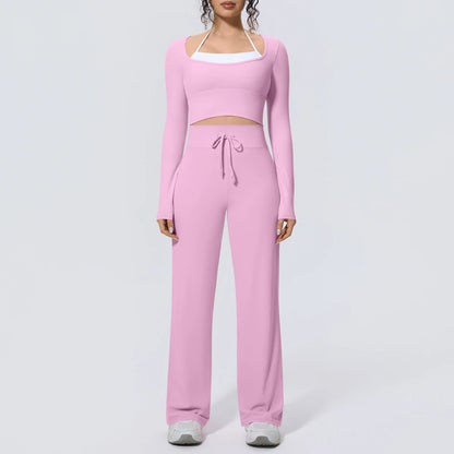 Helles rosa Yoga-Set: langarmiges Crop-Top und weite Hose mit Kordel an der Taille