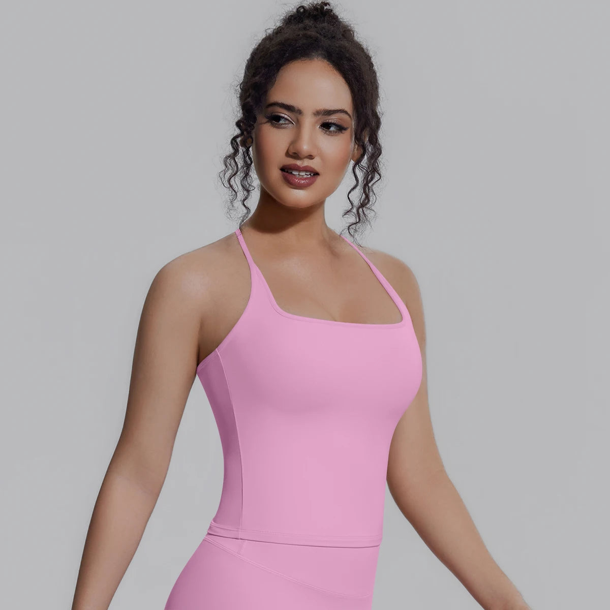 Sportweste für Fitness in Pink mit Trägern und Brustpolster, leicht seitlich