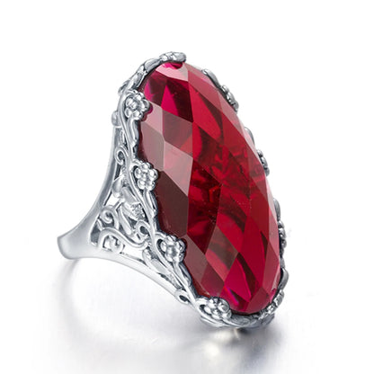 Damen-Ring aus 925er Sterlingsilber mit smaragdgrünem Stein und aufwändigem Blütenmuster