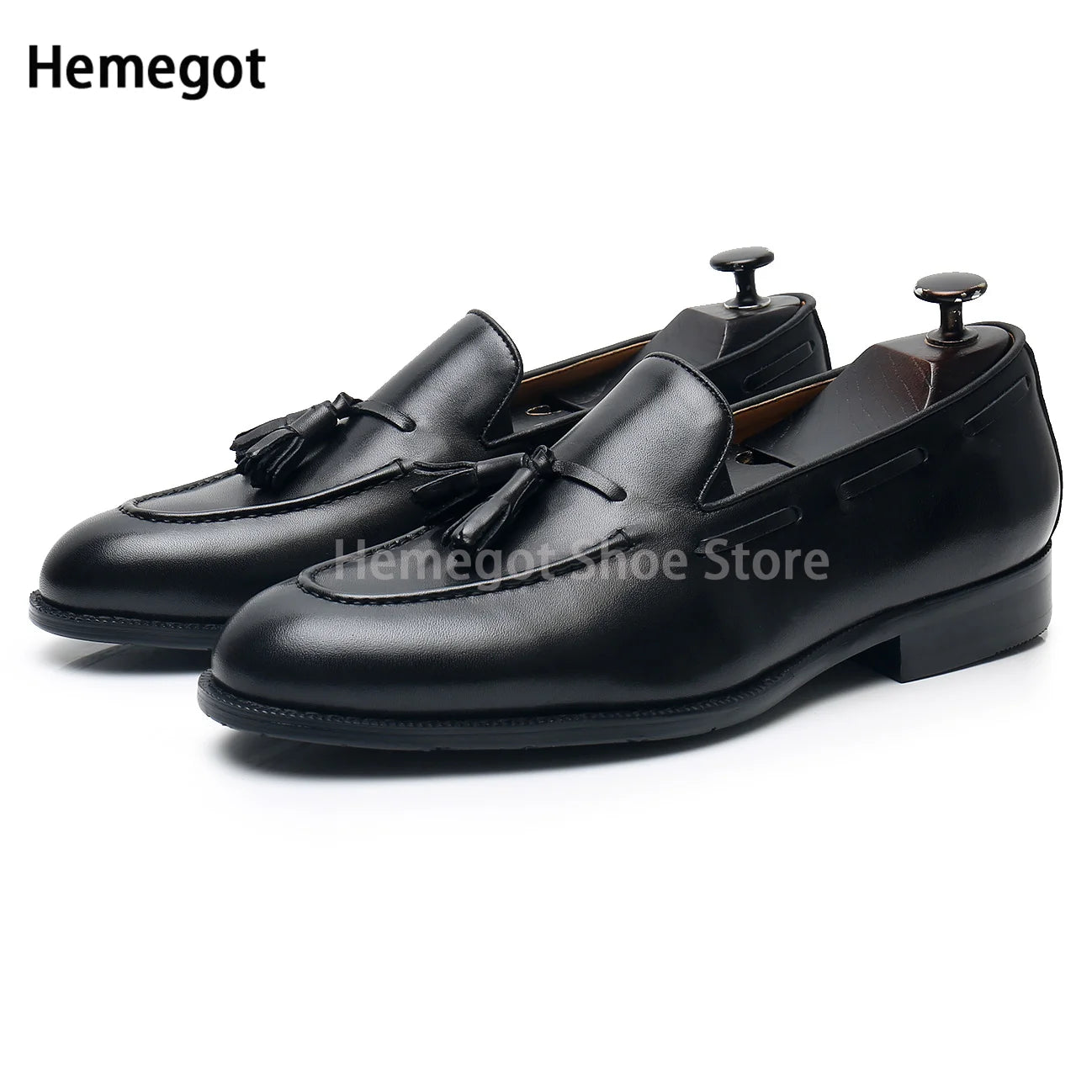 Schwarze Ledermokassins mit Quasten, Slip-on, flache Sohle mit Absatz