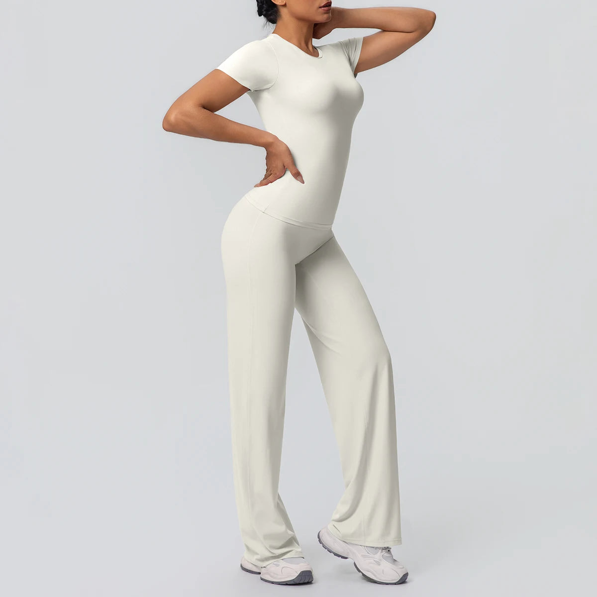 Damen-Yoga-Set in Hellivory: Kurzarm-Top und lange Laufhose