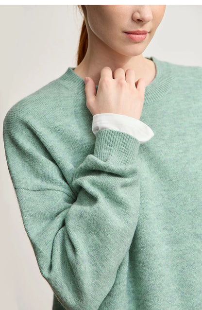 Detailansicht Damen-Strickpullover mintgrün mit Rippbündchen am Ärmel