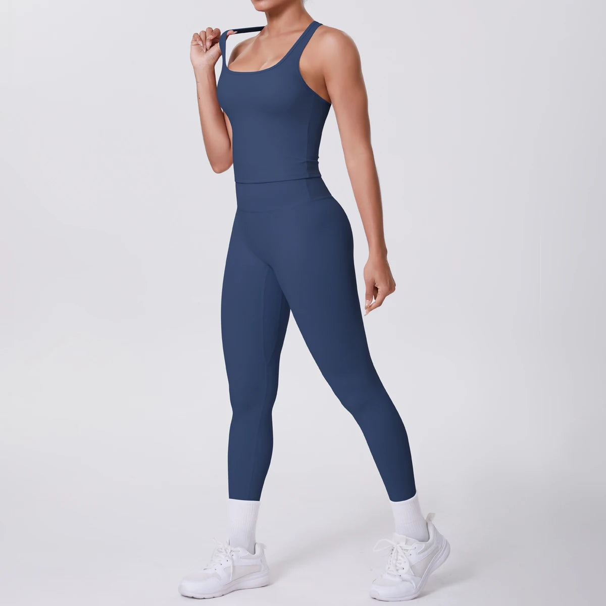 Damen-Yoga-Set: dunkelblaues Tanktop und Leggings, körperbetont, knapp über dem Knöchel