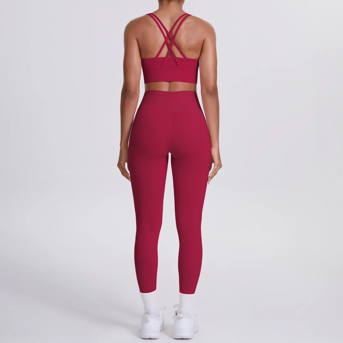 Fitness-Set Rot: gekreuzte Rückenträger am Sport-BH, High-Waist-Leggings