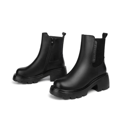 Schwarze Chelsea-Boots aus Leder mit Wollfutter und markantem Profil