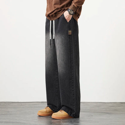 Männer Jeans mit elastischer Taille in schwarz-blauer Farbgebung im Hip Hop Stil
