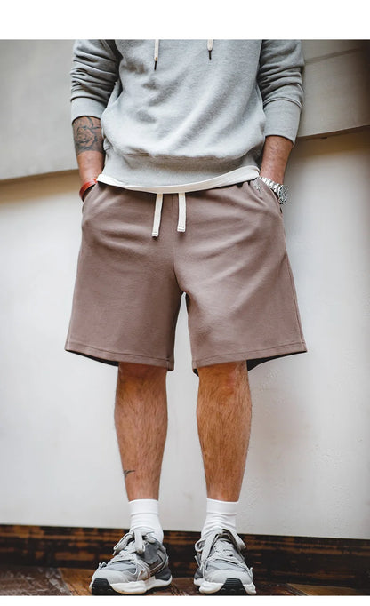 Herren Freizeitshorts aus atmungsaktivem Material mit gesticktem Blitzdesign