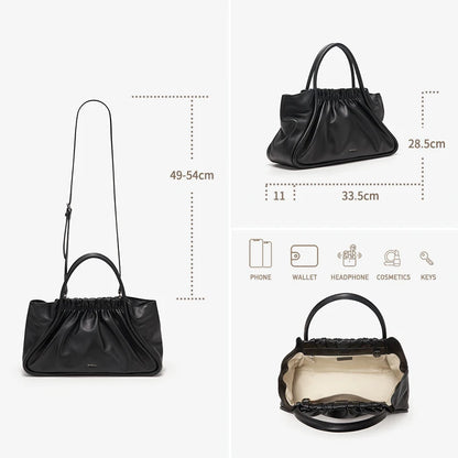 Schwarze Damenhandtasche aus Leder mit gerafftem Tunnelzug, langem Schulterriemen