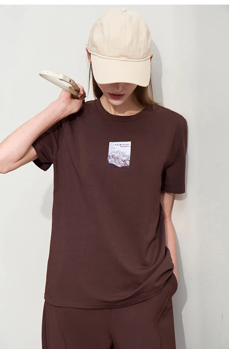 Damen T-Shirt aus Baumwolle mit lässigem O-Ausschnitt und modischer Stickerei