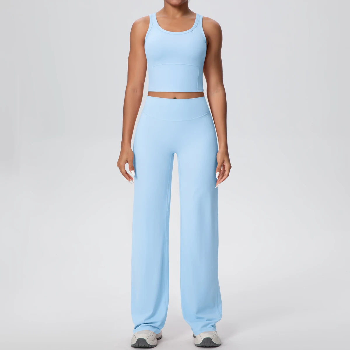 Schnelltrocknendes Yoga-Set mit cropped Tanktop und Schlaghose, hell (cremefarben)