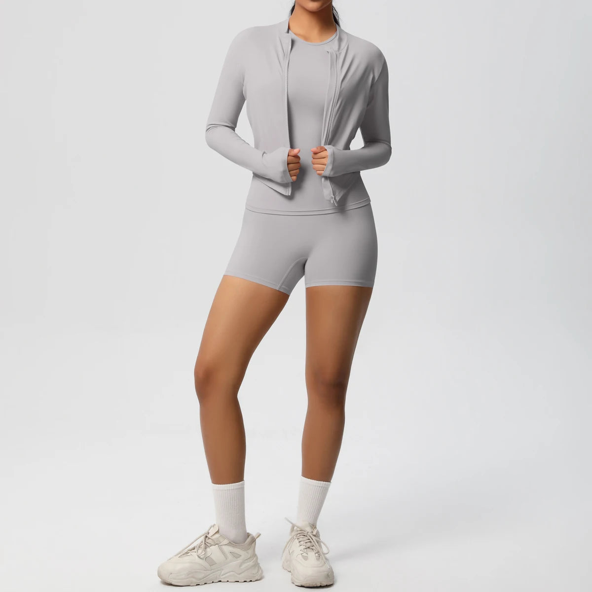 Damen-Yoga-Set: hellgraues Longsleeve mit Reißverschluss und kurze Leggings, 3-teilig
