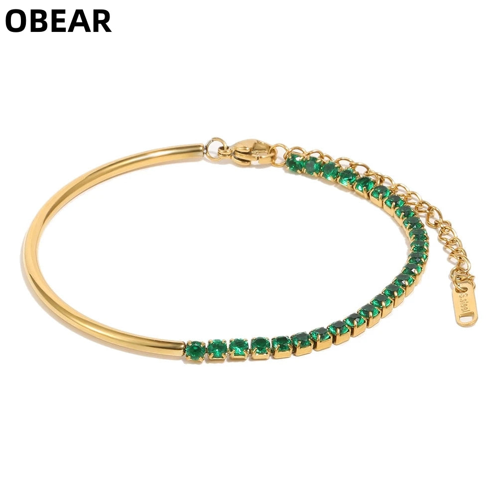 Goldfarbenes Tennisarmband für Damen mit grünen CZ-Steinen und Karabinerverschluss