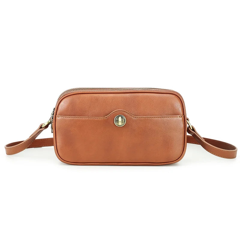 Kleine Schultertasche aus Karamellfarbenem Leder mit Reißverschluss vorn