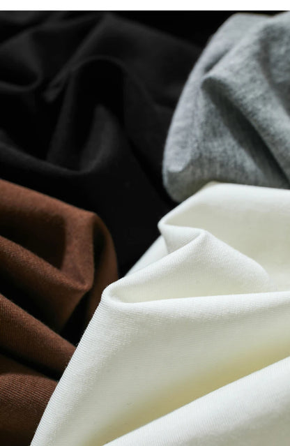 Damen T-Shirt im Minimalismus-Stil mit asymmetrischem Slash Neck und Raffen