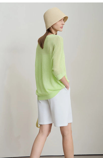 Damen-Strickpullover mit Rundhalsausschnitt, kurzärmelig, hellgrün, seitliche Rückenansicht
