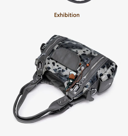 Damen-Hobo-Tasche aus gewaschenem Leder mit grau-Leoparden-Print und mehreren Fächern und viel Stauraum