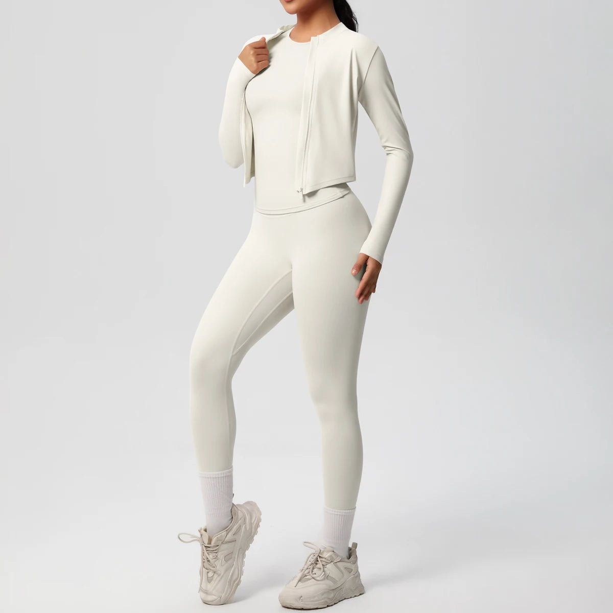 Damen-Yoga-Set in Hellbeige: High-Waist Leggings und langärmliges Top mit Reißverschluss
