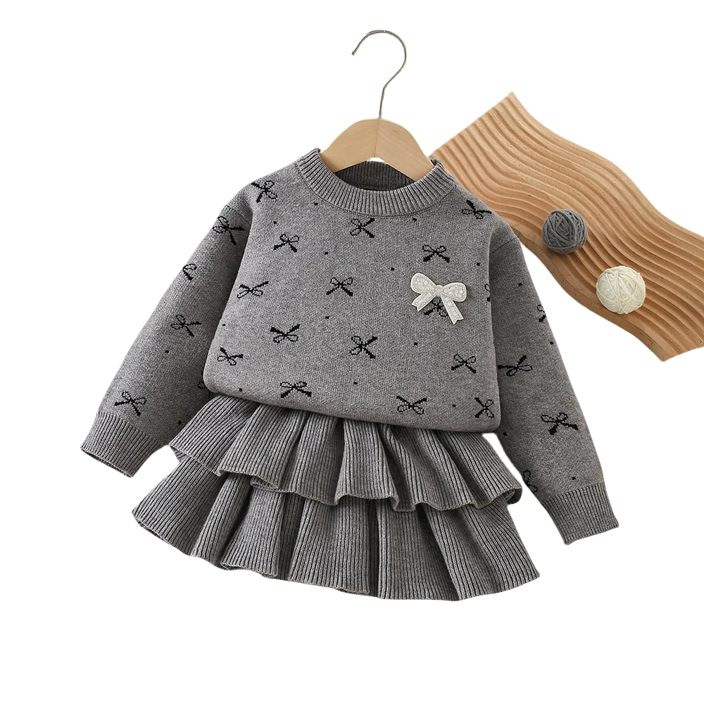 Mädchen Kleidungsset mit Bogen Druck Pullover und Faltenrock im 2-Teile Design