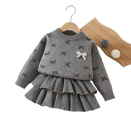 Mädchen Kleidungsset mit Bogen Druck Pullover und Faltenrock im 2-Teile Design