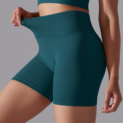 Nahtlose gestrickte Damen-Workout-Shorts, petrolblaugrün, Rückansicht, hoher Bund und Po-Formteil