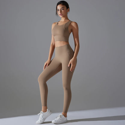 Damen-Yoga-Set in Hellbeige: ärmelloses Crop-Top und lange Laufhose, schmal geschnitten