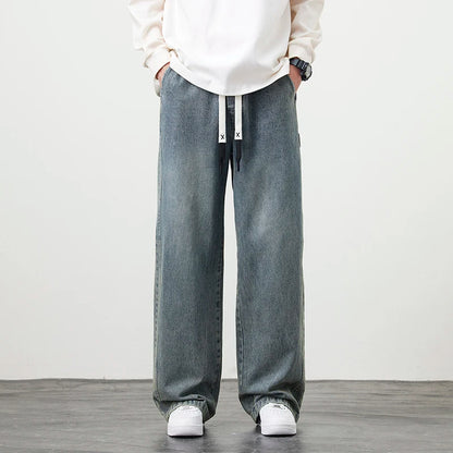 Männer Jeans mit elastischer Taille in schwarz-blauer Farbgebung im Hip Hop Stil