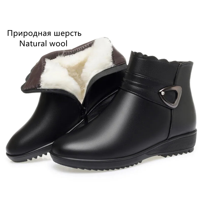 Damen Schneestiefel aus Leder, schwarz, mit weißem Wollfutter und Profilsohle