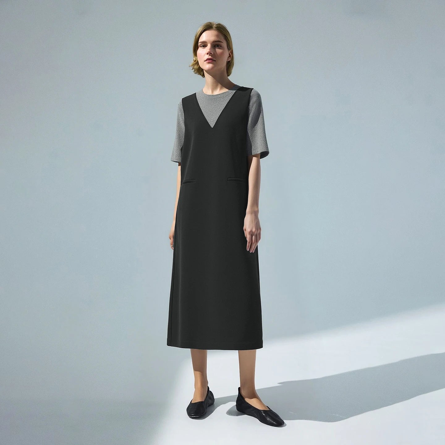 Stylisches Ärmelloses Damenkleid Mit Perlenschmuck Und Eleganter Passform